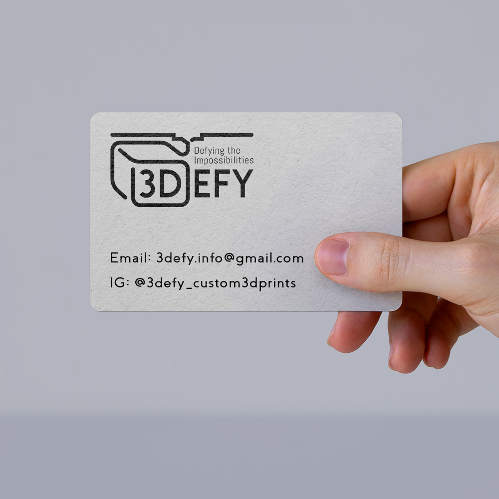 hand holding business card of 3defy